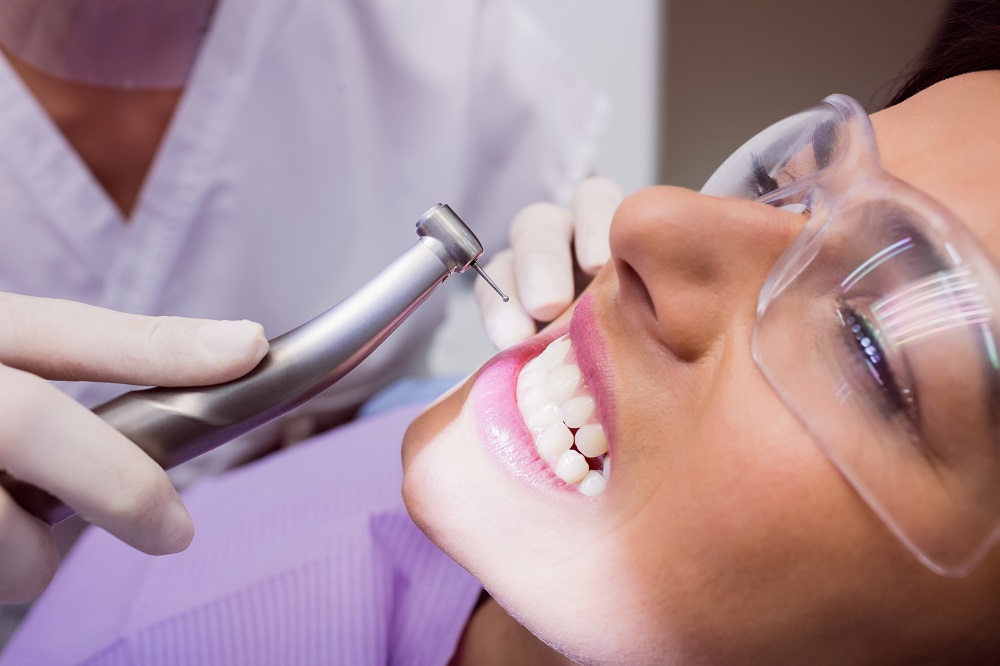 woman taking cosmetic dental treatment